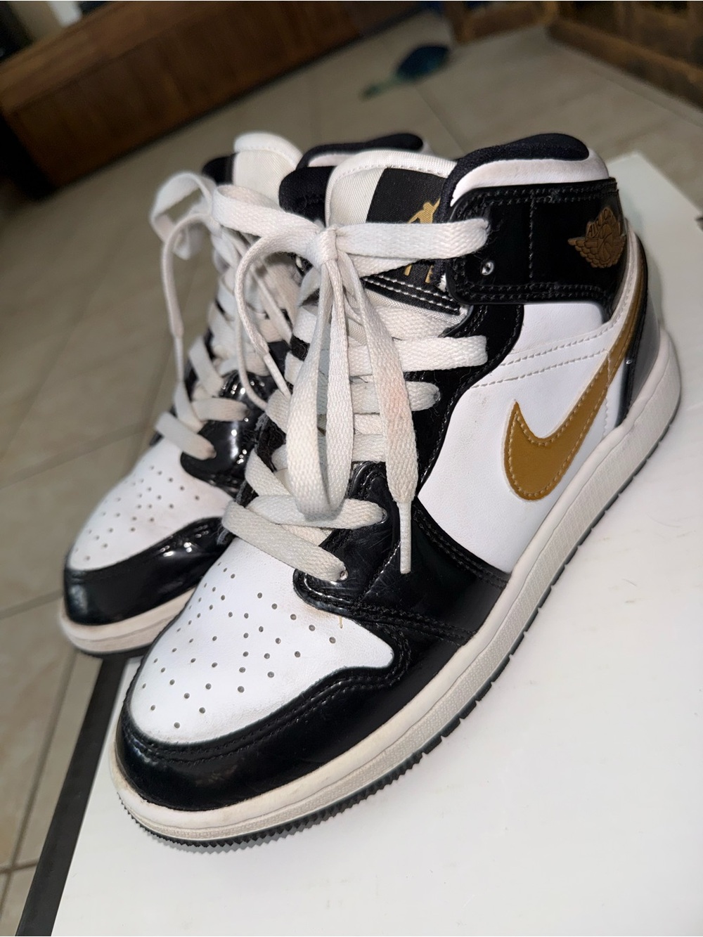 Nike High-Top Sneakers in White, Black & Gold